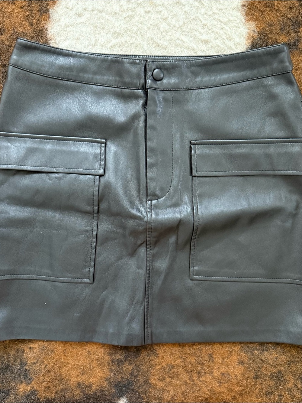 Black Leather Mini Skirt with Front Patch Pockets